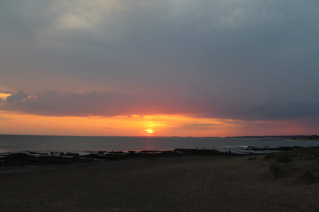Sunset on the beach of the Atlantic Oceanの写真素材