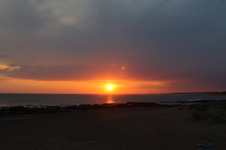 Beautiful sunset at the beach in the evening. Nature composition.の写真素材