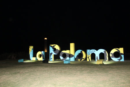 The word in colorful letters illuminated at night.の写真素材