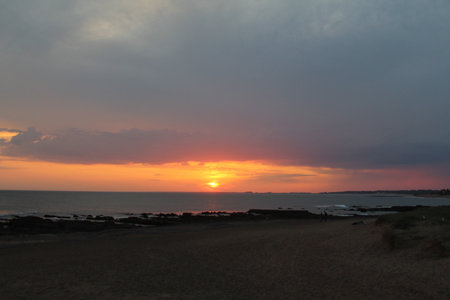 Sunset on the beach of the Baltic Seaの写真素材