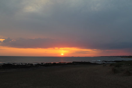 Sunset on the beach of the Baltic Seaの写真素材