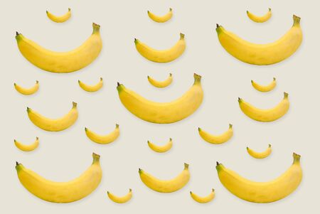 Yellow bananas arranged in the form of natural looking backgrounds.の写真素材