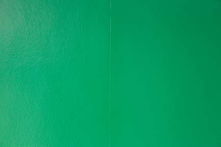 Dark green concrete wall for wallpaper and lines for abstract background with copy space and objects.の写真素材