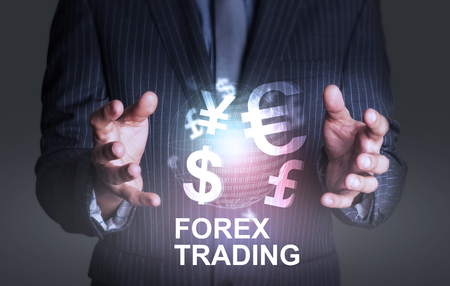 Holding world of currency forex tradingの写真素材
