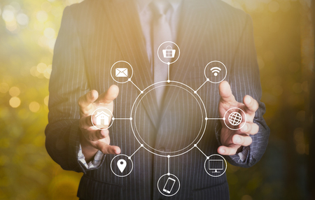 Holding laptop multichannel online communication networkの写真素材
