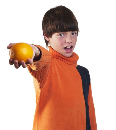 The white boy offers an orange on a white background の写真素材