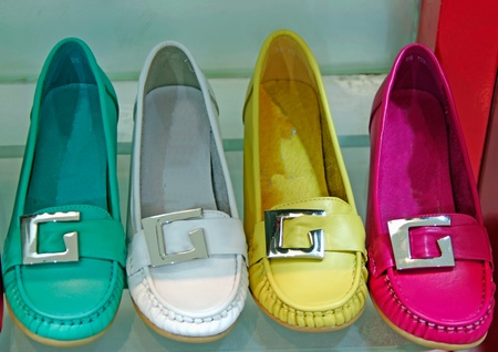 Different colors female shoe is it  isolatedの写真素材