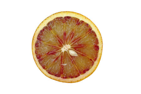 Blood red orange slice isolated on white backgroundの写真素材
