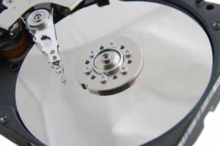 real open hard drive isolated on white ackgroundの写真素材