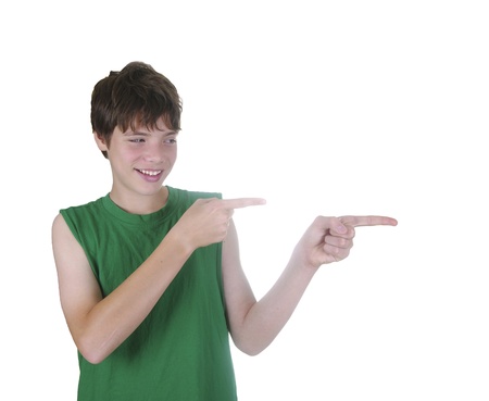  boy pointing with his finger - isolated over a white backgroundの写真素材