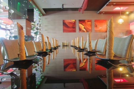Interior of a restaurant, modern design in few colors, orange and brown のeditorial素材