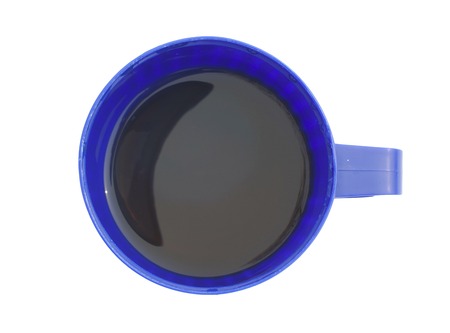 blue Cup of black tea over white background. Top viewの写真素材