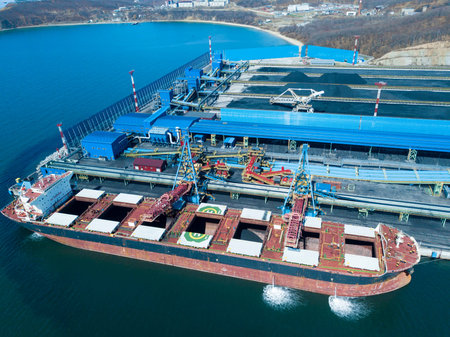 The third stage of the coal terminal is the port of Vostochy. Ship under loading Nakhodka Russia...
