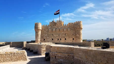 view of the Qaitbay fortress built on the site of the destroyed sixth wonder of the world of the Alexandrian lighthouseの写真素材