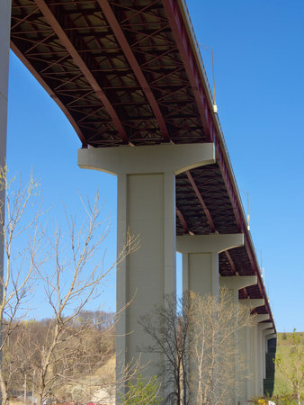 Single span of freeway bridge high overhead