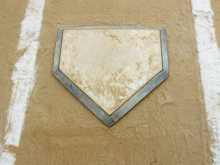 Close-up of home plate on a municipal baseball diamondの写真素材