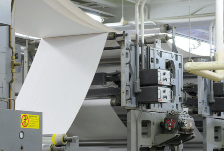 Paper threading its way through a printing press
