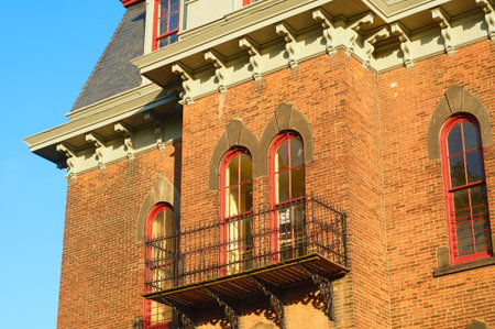 Ornate iron balcony on an old town hall now a historical museum