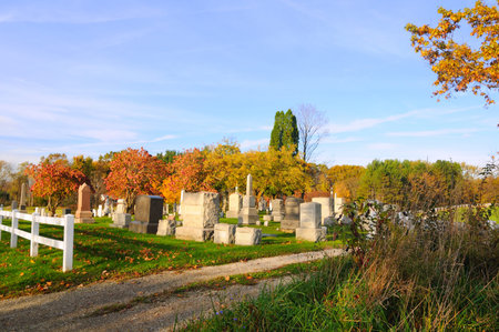 An old country cemetery in autumn sunlight