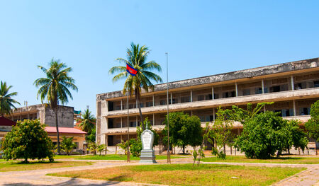 Phnom Penh, Cambodia - February 28, 2014  A memorial stone stands in the courtyard of the infamous Tuol Sleng prison in Phnom Penh Cambodia, site of Khmer Rouge torture, now a museumのeditorial素材