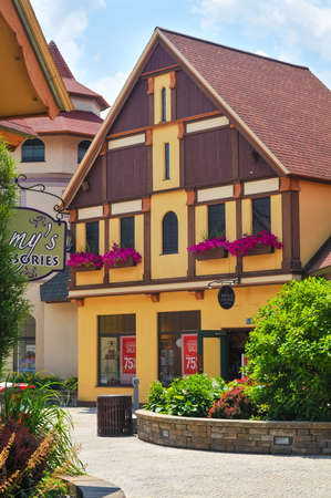 FRANKENMUTH, MI, USA - JUNE 28, 2014: German-style architecture forms the backdrop of River Place, a recently established collection of shops and attractions in this Michigan town known best for Christmas and German food.のeditorial素材