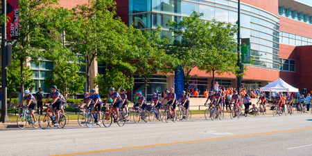 CLEVELAND, OH - JULY 23, 2015: The Pan Ohio Hope ride, a 4-day charity bike ride from Cleveland to Cincinnati sponsored by the American Cancer Society, gets underway at the starting point.のeditorial素材