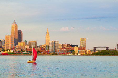 CLEVELAND, OH - JULY 24 2015: The port of Cleveland is seen from Lake Erie, just to the west of the mouth of the Cuyahoga. Cargo ships and pleasure craft share the water here.のeditorial素材