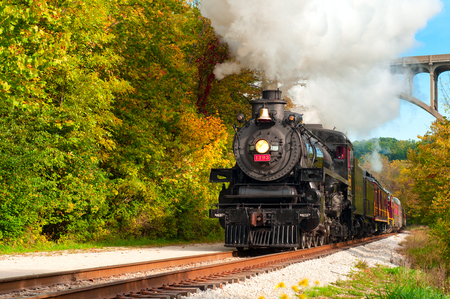 BRECKSVILLE, OH - SEPTEMBER 29, 2012: A vintage steam engine makes a special excursion on the Cuyahoga Valley Scenic Railroad through Brecksville, Ohio, on September 29, 2012. The "Steam in the Valley" event takes place annually.のeditorial素材