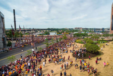 CLEVELAND, OH - JUNE 22, 2016: Crowds line the streets next to the Q in anticipation of the victory parade celebrating the Cleveland Cavaliers' winning their first NBA title three nights earlier.のeditorial素材
