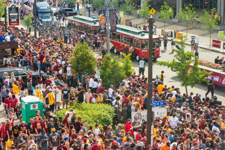 CLEVELAND, OH - JUNE 22, 2016: Crowds jam the streets at the start of the Cleveland Cavaliers' NBA...
