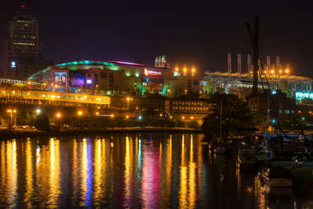 CLEVELAND, OH - MAY 28, 2016: View of Quicken Loans Arena (the Q) glowing above the Cuyahoga River. The Q will be the site of the NBA Finals and of the Republican National Convention in July.のeditorial素材