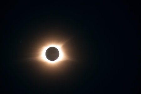 Solar eclipse of August 2017 reaches totality, with a star or unidentified object just above at left