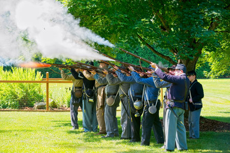 TWINSBURG, OH - JUNE 30, 2018: Civil War reenactors, here representing both Union and Confederate...