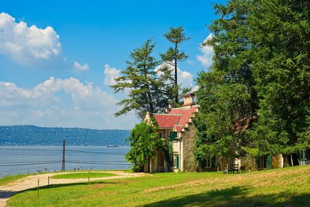 TARRYTOWN, NY - SEPTEMBER 5, 2018: Washington Irving's Sunnyside cottage overlooks the Hudson River. Irving spent several decades at this home, which is now a museum.のeditorial素材