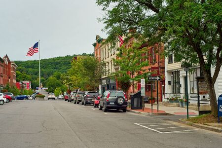 COOPERSTOWN, NY - SEPTEMBER 8, 2018: The picturesque Main Street of this baseball town is lined with attractive shops, cafes, and businesses.のeditorial素材