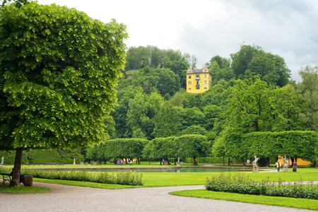 SALZBURG, AUSTRIA - MAY 28, 2019: The Hellbrunn Museum is perched high above the estate with its...