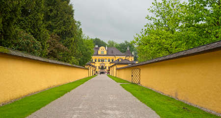 Hellbrunn Palace, built in 1613-19 by Prince-Archbishop Markus Sittikus of Salzburg, Austria, sits at the end of a long, walled-in promenade.のeditorial素材