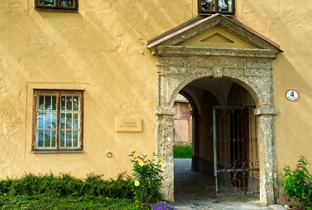 The outer gate to the Nonnberg Abbey (Stift Nonnberg) in Salzburg, Austria; the gateway leads to a...