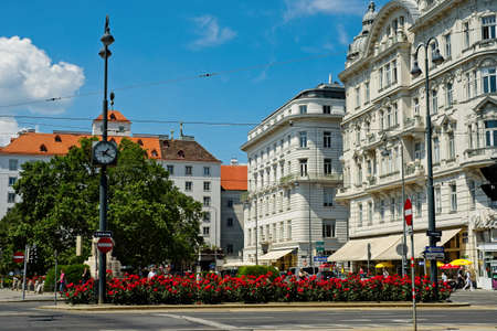 VIENNA, AUSTRIA - JUNE 4, 2019: Elegant old buildings and colorful flowers on the famed Ringstrasse create a picturesque, old-world ambience in the district north of the City Park.のeditorial素材