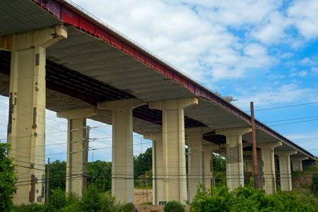 Construction work on the I-480 freeway bridge near Cleveland, Ohio, with a temporary third span in...