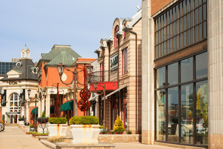 WOODMERE, OH, USA - APRIL 30, 2022: The front facades of several retail outlets at Eton Center, an upscale shopping area on the eastern outskirts of Cleveland.のeditorial素材