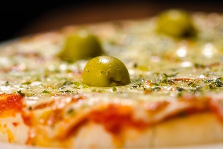 Pizza with olivesの写真素材