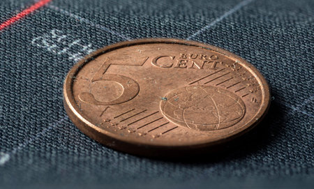 Dirty five euro cent coin in a extreme close up picture