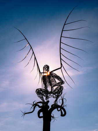San Sebasti?n de los Reyes, Madrid, Spain; 07/06/2020: Angel I monument, skeleton of an angel with wings at sunrise in the international sculpture parkのeditorial素材