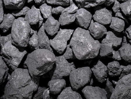 A pile of carbon stones piled up for later combustion, forming an energetic background of this...