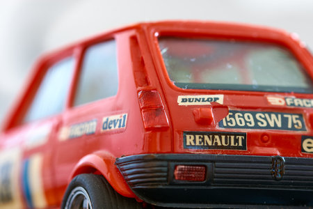 Malaga, Spain; 08-16-2016: Old slot car of the Spanish brand Scalextric, replica model of a red Renault 5 decorated with the French flagのeditorial素材