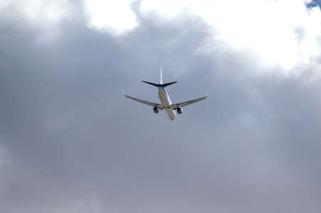 Madrid, Spain; 09-25-2021: KLM Airline Boeing 737 viewed from a low angle and from behind just after take off in a cloudy skyのeditorial素材