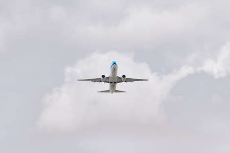 Madrid, Spain; 09-25-2021: Madrid, Spain; 09-25-2021: Boeing 737 of the KLM airline seen with a low angle just after take off in a cloudy skyのeditorial素材