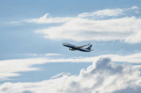 Madrid, Spain; 09-25-2021: Ryanair airline Boeing 737 airplane flying over a cloudy sky shortly after take offのeditorial素材