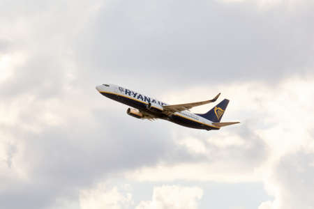 Madrid, Spain; 09-25-2021: Ryanair airline Boeing 737 airplane flying over a cloudy sky shortly after take offのeditorial素材